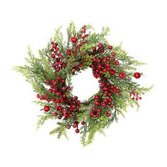 a christmas wreath with red berries and greenery