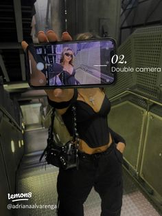 a woman taking a selfie with her cell phone in front of her face and text that reads, double camera