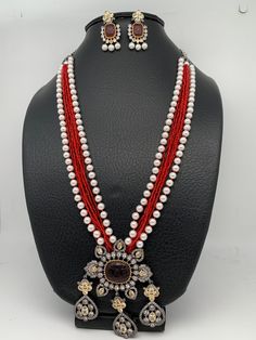 Red Stone AD Victorian Polish Pendent and Red Crystal Beads Pearls Necklace, Rani Haar, Indian Jewelry, Pakistani Jewelry, Trendy Jewelry, Rani Haar, Indian Jewelry, Pakistani Jewelry, Trendy Jewelry Necklace Length : 24 Inches; Earring Length : 2 inches Red Pearl Temple Jewelry Necklace For Festivals, Red Pearl Necklace Temple Jewelry For Festivals, Red Temple Jewelry Pearl Necklace For Festivals, Traditional Red Beaded Pearl Necklace, Red Beaded Chain Necklace For Wedding, Red Pearl Necklace For Celebration, Temple Jewelry Style, Festive Red Pearl Necklace With Round Beads, Red Faceted Beads For Festivals, Festive Red Necklace With Silver Beads