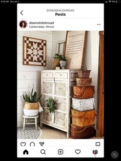 an old dresser with some plants on top of it