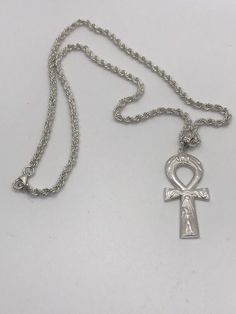 Akhenaten Ankh (Key of Life) pendant - Sterling Silver - You'll be impressed by the quality and great details please contact us if you need a specific order Please contact us if you have any question, thank you for visiting our shop.You can purchase this pendant only or with its chain Our official page https://www.facebook.com/fromegyptwithlove.epy/ You can purchase this pendant only or full necklace , for its chain contact us to add it You can purchase this pendant only or with its chain Engraved Cross Pendant Necklaces For Collectors, Vintage Silver Ankh Jewelry, Vintage Engraved Ankh Jewelry, Traditional Silver Ankh Jewelry, Silver Ankh Amulet Necklace, Traditional Ankh Silver Jewelry, Silver Ankh Symbolic Necklace, Symbolic 925 Stamped Pendant Necklace, Symbolic Pendant Necklaces Stamped 925