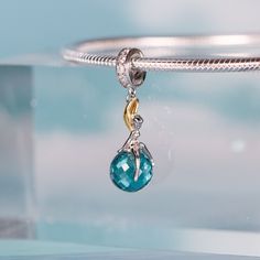 This is charm only, bracelet is sold separately. These beautiful dangle fairy charm for bracelet features a cute pixie elf fairy sit on a blue glass CZ stone with diamond cut texture. The dangle fairy charm will fit Pandora bracelet or you can pick out our 925 sterling silver bracelet for charm. Add this fairy dangle charm to your existing bracelet or as gift for your love one. Dimensions: L1.18 x W0.35 in (30x 9.1mm)Hole diameter: 0.18 in (4.7mm) Jewelry Care: See more information about how to Silver Charms Jewelry For May Birthstone, Silver Jewelry With Charms For May Birthstone, Silver Jewelry With May Birthstone Charms, Elegant Sterling Silver Gemstone Charms, Sterling Silver Round Pendant Charms With Gemstone, Elegant Sterling Silver Moon Charm, Elegant Silver Moon Charm, Sterling Silver Gemstone Charms, Sterling Silver Birthstone Pendant Charms