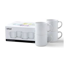 three white coffee mugs sitting next to each other in front of a boxed box