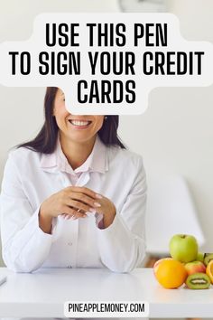 a woman sitting at a table with fruit on it and the words use this pen to sign your credit cards