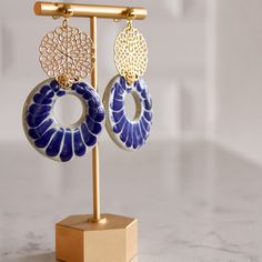 These minimalist and elegant, one of a kind drop earrings were created by joining the traditional and vibrant Talavera from Puebla and adding the finishing touch of our talented artisan partner from Mexico City. The fusion of these two talents creates a modern, bohemian and versatile piece of wearable art. Perfect for everyday wear, special occasions or as a gift for that special someone in your life. These statement earrings are embellished with 14K gold plated circular motifs. They are 2.5"in Modern Bohemian Style, Blue Wedding Jewelry, Blush Earrings, Gold Round Earrings, Rose Gold Bar, Peach Earrings, Silver Chain Earrings, Cobalt Blue Earrings, Teal Earrings