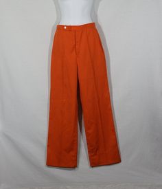 "Here's a pair of rare vintage original J.G. Hook label flared wide leg orange pants! These are sweet 70's trousers that have a flattering high rise and high waist fit. These vintage slacks are in a brilliant, stand out orange color and they have a zipper fly, flat front and a really great long and wide leg cut. Sweet pants! They are in great pre-owned vintage condition with usual/more minor signs of wear and they are as-found because they have been nicely altered at the leg hem. Check out the p Vintage Cotton Pants For Spring, Retro Wide Leg Pants For Work In Fall, Retro Wide Leg Pants For Fall, Vintage Cotton Spring Pants, Vintage Straight Leg Summer Pants, Vintage Straight Leg Pants For Summer, Retro Wide Leg Solid Bottoms, Retro Wide-leg Pants For Workwear, Retro Wide Leg Solid Color Pants