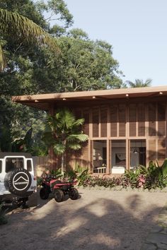 an image of a house that is made out of wood and surrounded by palm trees