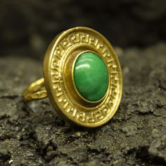 Ancient Greek Meander Green Jade Silver Ring | Eternity Key Ring | 925 Sterling Silver Ring 24K Gold Plated | Greek Art Jewelry Our shop offer free ring sizing Handcrafted hammered ring Metal : 925 Sterling Silver Plating : 24K Gold Band Width : 2 mm Medalion Size : 26 x 26 mm Medalion : Reproduction Bronze Gem Stone : Jade Gem Size : 12 X 12 mm Ring Weight : 11.8 grams Ring Size : US 6 (The size you want is made for free). (We used the US standard sizing) **Custom Orders is Made** As pellada fa Gold Emerald Ring Gift, Spiritual Gold Emerald Ring With Gemstone, Spiritual Gold Emerald Ring, Traditional Gold Emerald Ring For Gift, Gold Emerald Ring With Spiritual Style, Handmade Gold Emerald Ring, Handmade Gold Rings With Emerald, Handmade Gold Emerald Ring For Anniversary, Traditional Gold Emerald Ring As Gift