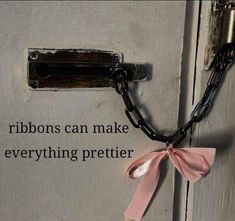 a pink ribbon tied to a lock on a door with the words ribbons can make everything prettier