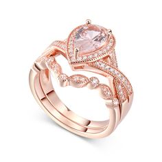 a rose gold engagement ring set with an oval cut morganite surrounded by pave diamonds