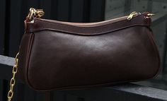 MATERIAL - Made of 100% high quality full-grain leather (Italy vegetable-tanned leather), solid color, feels cosy to touch,delicate, durable. The hardware parts are made of cast molding thick hardware, top metal hardware. The stitching is well-made, firm and smooth. YKK zipper.DIMENSIONS - 5.3L*3.3W*11H(inch) / 13.5L*8.5W*28H(cm)STRUCTURE - This shoulder bag contains 1 main compartment, 1 inner slip pocket, 1 inner zipper pocket, 2 front pockets. Comfortably holds wallet, mobile phone, cosmetics Timeless Brown Shoulder Bag With Metal Hardware, Brown Clutch Bag With Metal Hardware, Leather Shoulder Bag With Chain Strap, Handheld, Leather Crossbody Shoulder Bag With Gold-tone Hardware, Brown Shoulder Bag With Gold-tone Hardware, Brown Crossbody Shoulder Bag With Gold-tone Hardware, Brown Crossbody Bag With Silver-tone Hardware, Retro Women, Women Bags Fashion