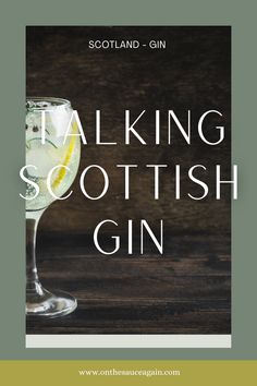 a glass of gin with the words talking scottish gin on it in front of a wooden background