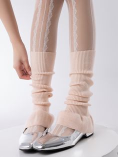 Elevate your look with these ballet-inspired leg warmers. Crafted in a solid color, these knit leg warmers add a touch of elegance to any outfit. The flared design at the bottom gives them a stylish and feminine touch.   Please note that this product includes one pair of leg warmers only. Fall Season Pink Stretch Knee-high Socks, Fitted Ribbed Leg Warmers For Spring, Fitted Knee-high Socks For Spring, Fitted Pink Knee-high Socks For Fall, Spring Fitted Ribbed Knee-high Socks, Spring Ribbed Fitted Knee-high Socks, Spring Balletcore Stretch Bottoms, Fitted Full Length Fall Socks, Pink Knee-high Leg Warmers For Fall