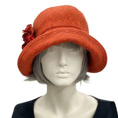 Cloche hat vintage style 20s ns 30s burnt orange wool hydrangea flower brooch close up brooch view Vintage Orange Hat With Curved Brim, Fitted Orange Hat With Short Brim, Orange Fitted Hat With Short Brim, Fitted Wide Brim Orange Hat, Elegant Orange Short Brim Hat, Orange Curved Brim Hat For Kentucky Derby, Orange Short Brim Hat For Kentucky Derby, Elegant Orange Brimmed Hat, Orange Flat Brim Hat