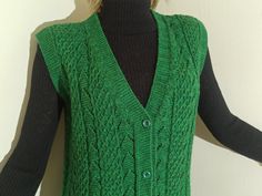 This is a v-neck vest for women which is knitted with blended high quality yarns in green color. This sleeveless cardigan keeps you warm in fall - winter. It has green buttons to close the front side of the waistcoat, it has pockets also. This cozy sweater is for large bodies which actually depends on your body shape. If your size is between medium and large then it also fits on you. Vest length:73cm (28,7") width:106cm (41,7"), the height of the woman model in the photos: 168cm (5'6"), her bust Sweater Sleeveless, Open Sweater, Sleeveless Cardigan, Cozy Knit, Vest Outfits, Knit Vest, Green Sweater, Cozy Knits, Knit Jacket