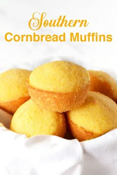 several cornbread muffins stacked on top of each other in a white bowl