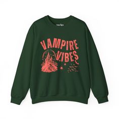 Sink your teeth into Halloween fashion with the Eddy and Rita Women's Heavy Crewneck Sweatshirt featuring the phrase "Vampire Vibes" in a spooky, stylish design. This heavyweight sweatshirt provides maximum warmth and comfort, making it perfect for those crisp autumn nights. With its relaxed fit, this sweatshirt is ideal for layering over your favorite Halloween ensemble or wearing solo for a cozy night in. Whether you're hitting a Halloween party, trick-or-treating, or just enjoying the season, Gothic Halloween Graphic Sweatshirt, Punk Halloween Sweatshirt With Graphic Print, Punk Style Halloween Sweatshirt With Graphic Print, Gothic Letter Print Tops For Fall, Punk Halloween Sweatshirt With Letter Print, Vampire Vibes, Crisp Autumn, Halloween Graphic, Autumn Night