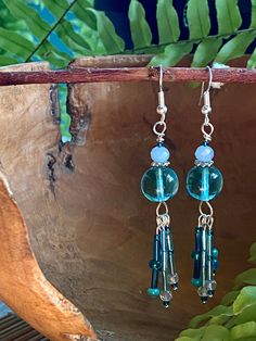 Dazzling and playful aqua / teal blue dangle earrings that really make a statement. These are lovingly handcrafted using components from salvaged jewelry and new findings and accent beads. Packaged on display card in an eco-friendly box with silicone backings to hold secure. Findings are silver-plated.  I take old and / or unwanted jewelry and break down the components to be reused in new jewelry pieces, a process that is Earth-friendly, leading to lower waste, not to mention it is lots of creat Turquoise Beaded Dangle Earrings For Gift, Turquoise Dangle Beaded Earrings For Gift, Turquoise Czech Glass Dangling Beads Earrings, Turquoise Czech Glass Dangling Earrings, Turquoise Czech Glass Earrings With Dangling Beads, Handmade Aquamarine Dangle Earrings, Unique Blue Beaded Earrings Nickel-free, Unique Blue Beaded Nickel-free Earrings, Turquoise Aquamarine Dangle Earrings