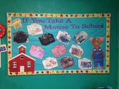 a bulletin board with magnets on it that says if you take a mouse to school