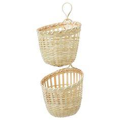 two wicker baskets hanging from the ceiling