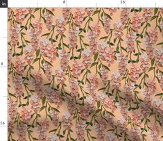 an orange and pink flowered fabric with green leaves on it, as well as the measurements