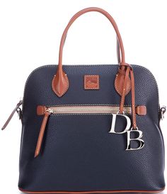 From the Pebble Collection by Dooney & Bourke&#x2C; the Large Domed Satchel Bag features:leatherZipper closureLinedInterior: zip pocket&#x2C; 2 slip pockets and a key hookExterior: zip pocketApprox. H 9.5" x W 6.5" x L 12" bag; 21.5" strap drop; 4.5" handle dropImported. Dooney And Bourke Handbags, Pebble Collection, Mommy Things, Bridal Handbags, Diy Leather Bag, 2023 Vision, Stylish Handbags, Handbag Heaven, Genuine Leather Handbag