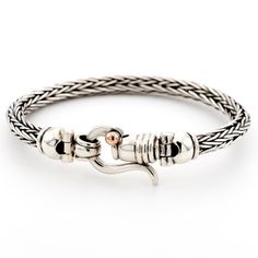 "925 Sterling Silver Braided Rope Foxtail Bracelet, Interwoven Silver Bracelet with a Handmade 972 Sterling Silver Hook Clasp Central Motif For Men And Women Artisan handcrafted sterling silver rope bracelet with a unique handmade silver handcrafted closer clasp -designed hook combined with decorative elements of 9K rose gold as the centerpiece of the bracelet that gives it such a statement and a unique look. Elements and locks are designed and manufactured specifically for these models. Adorned Silver Rope Bracelet, Chain Bracelet For Women, High End Jewelry, Artisan Bracelets, Titanium Jewelry, Silver Chain Style, Braided Rope, Unique Jewelry Designs, Decorative Elements