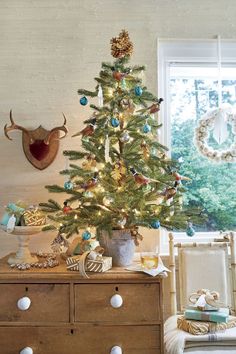 a decorated christmas tree in a living room