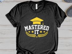 Mastered it shirt master degree graduation gifts idea for men women kids     Unisex Gildan T-shirt * 100% ring-spun cotton * Sport grey is 90% ring-spun cotton, 10% polyester * Dark heather is 65% polyester, 35% cotton * 4.5 oz/y² (153 g/m²) * Pre-shrunk * Shoulder-to-shoulder taping * Quarter-turned to avoid crease down the center     Unisex Bella Canva Shirt * 100% combed and ring-spun cotton (heather colors contain polyester) * Fabric weight: 4.2 oz (142 g/m2) * Pre-shrunk fabric * Shoulder-to-shoulder taping * Side-seamed     Unisex Bella Canva Tank top * 100% combed and ringspun cotton * Tri-blends are 50% polyester/25% combed/25% ringspun cotton/rayon * Side-seamed, unisex sizing * Sizes - XS-2XL     Women Shirt Next Level 3900 100% combed ringspun cotton (fiber content may vary for Pre-shrunk Cotton T-shirt For Graduation Party, Black Pre-shrunk T-shirt For Graduation Gift, Cotton Graduation T-shirt, Cotton T-shirt For Graduation, Cotton T-shirt For Graduation Party, Master Degree Graduation, Masters Degree Graduation, Degree Graduation, Mastered It