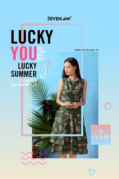 a woman standing in front of a palm tree wearing a dress that says lucky you