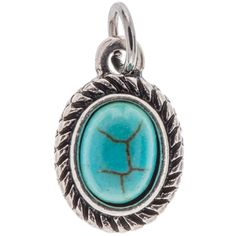 a pendant with a turquoise stone in the center and silver wire around it, on a white