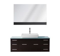 a white sink sitting under a mirror on top of a wooden cabinet next to a wall mounted faucet