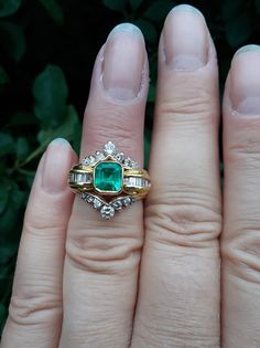 Beautiful 18k Yellow Gold, Approximately 1ct Cushion Cut Colombian Emerald, Diamond Baguette ring.. all sales are final. Weight is 5.5 Grams. Size 7 3/4.. All sales are final  Some Pics ENLARGED to see details  Very Good Pre Owned Vintage Condition.. Ring Guard is NOT INCLUDED, just to show some ideas.. some pics ENLARGED to see details. Antique Box for Display only.ATTENTION BUYERS ALL ITEMS FROM MY SHOP MUST BE PURCHASED STRAIGHT FROM ETSY.COM  NOT FROM OFFSITE ADDS  All orders purchasing from Diamond Baguette Ring, Diamond Baguette, Ring Guard, Baguette Diamond Rings, Baguette Ring, Baguette Diamonds, Colombian Emeralds, Green Diamond, Art Deco Ring