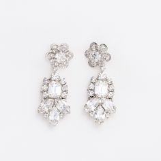 Meet our stunning LALE Earrings with Swarovski crystals. Featuring round and marquise shaped Swarovski crystals creating a unique design and a gorgeous pair of earrings! The LALE Earrings are a daintier version of our CEMILE earrings!. Our LALE Earrings are a perfect pair to add the right amount of sparkle to your look on your special day! The shine on these earrings is impeccable. Handcrafted with the Highest Quality Materials Swarovski Crystals Platinum plated - Guards against scratches and ta Swarovski Drop Earrings, Crystals Earrings, Shaped Crystals, Boutique Couture, Swarovski Crystal Earrings, Earrings Wedding, Shine On, Silver Drop Earrings, Wedding Jewelry Sets