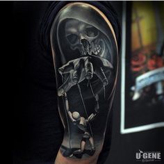 a man's arm with a skeleton holding an umbrella and two people on it