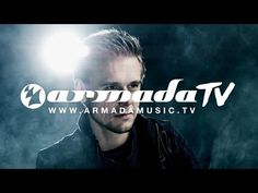 a man standing in front of a dark background with the words armada tv on it