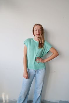 # Visit the Shop # https://www.etsy.com/shop/DamselflyGoods Awesome green/teal/turquoise slouchy 90s tee! Tee is perfectly oversized and has that classic 90s texture!  100% polyester Size medium/large Measurements lying flat: Width (across the chest): 19 inches Length: 22 inches This item is in excellent vintage condition! All items are stored in a smoke-free, pet-free environment :)  Feel free to contact me with any comments or questions regarding this listing Green Crew Neck Short Sleeve Top For Everyday, Everyday Green Crew Neck Short Sleeve Top, Green Crew Neck Short Sleeve Top, Green Relaxed Fit Short Sleeve Top For Spring, Green Short Sleeve Top Relaxed Fit For Spring, Green Short Sleeve Top For Spring With Relaxed Fit, Green Tops For Everyday Summer Wear, Green Everyday Tops For Summer, Green Summer Tops For Everyday