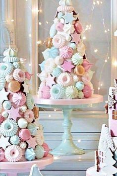 there are two cakes decorated in pastel colors