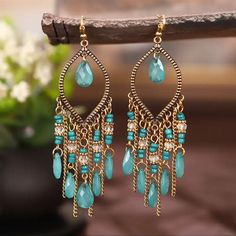 Style: Geometric Drop Material: Metal Color: Turquoise/Antique Gold Cheap Beaded Chandelier Drop Earrings, Jewelry Making Earrings Greatergood, Affordable Large Beaded Dangle Jewelry, Glass Beads Jewelry Earrings, Making Drop Earrings, Home Made Earrings Beads, Aqua Beaded Earrings, Dangly Earrings Bead, Jewelry Crafts Earrings