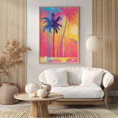 a living room with a couch, table and painting on the wall above it that has palm trees