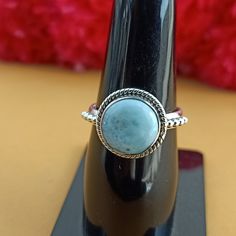 Handmade Larimar bohemian ring , you can wear this ring as a party wear ring .. Title - Larimar stone ring Stone color - Blue Stone shape - Round Material - Sterling silver 925 Note - We use natural gemstones, so color shade may be little bit different .. we are giving you best quality rings on best price .. contact us for more quantity Bohemian Stackable Rings As Gift, Bohemian Stackable Round Moonstone Ring, Bohemian Style Midi Rings As Gifts, Handmade Spiritual Round Midi Rings, Bohemian Midi Rings For Anniversary, Bohemian Stackable Moonstone Ring, Bohemian Gemstone Midi Rings For Gift, Bohemian Crystal Promise Ring, Adjustable Bohemian Crystal Ring Stamped 925