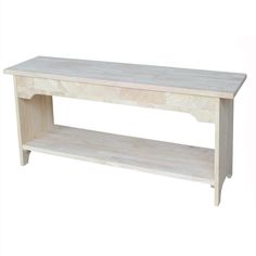 a white wooden shelf sitting on top of a floor