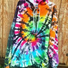 Rainbow Bright & Black Tie Dye Sweatshirt // Unisex Adult Sweatshirt // Crew Neck or Hoodie Tie-Dye makes everyone happy :) Made to Order - There will be slight variations in design, and each one is unique. Dyes & Process used will ensure your shirt stays bright & colorful for years to come. *The front and back will look different, like pictured* Sweatshirts are 90% cotton, 10% poly. Wash & Care: All items are pre-washed so they should not bleed or fade color. I recommend to wash Multicolor Fleece Hoodie Top, Multicolor Fleece Hoodie, Rainbow Long Sleeve Sweatshirt For Winter, Multicolor Fleece Sweatshirt With Drawstring Hood, Multicolor Crew Neck Sweatshirt With Drawstring Hood, Rainbow Long Sleeve Hoodie For Winter, Rainbow Long-sleeve Winter Hoodie, Rainbow Long Sleeve Winter Hoodie, Rainbow Long Sleeve Sweatshirt For Fall