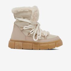 GREATS - The Madison Boot - Sand - Women's Shoe Beige Sheepskin Boots For Winter, Beige Sheepskin Winter Boots, Winter Shearling Boots With Lug Sole, Beige Shearling Boots With Faux Fur Lining, Casual Boots With Faux Fur Trim In Shearling, Casual Shearling Boots With Faux Fur Trim, Casual Boots With Faux Fur Trim And Shearling, Casual Boots With Faux Fur Trim, Beige Insulated Winter Boots