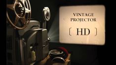 an old movie projector with the words vintage projector on it's side