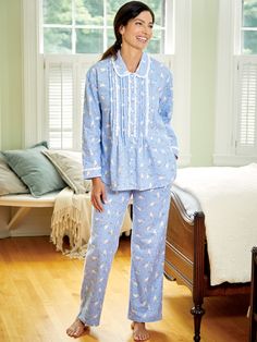 This beautiful pajama set is tailored in Lanz's premium flannel and features a soothing dove print to keep you feeling warm, cozy, and relaxed so you can get the rest you need. The pajama top has a pintucked bodice with cotton eyelet trim and pintucks on the cuffs. The pajama bottoms have a drawstring elastic waist and side seam pockets. Premium cotton flannel pajama set Button front top is approx. 27" long Elastic-waist bottoms have an approx. 29" inseam 100% cotton flannel Machine wash and dry Dove Print, Flannel Pjs, Night Suit For Women, Flannel Nightgown, Cotton Pajamas Women, Vermont Country Store, Plus Size Sleepwear, Flannel Pajama Sets, Cotton Pajamas