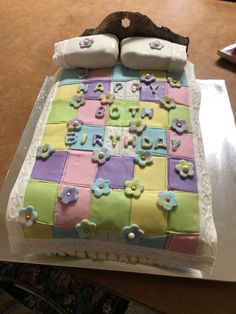 a decorated cake sitting on top of a table