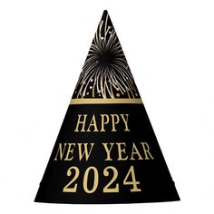 a black and gold happy new year party hat with fireworks on it's side