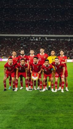 the portugal team line up for a group photo before their match against belgium at the olympic stadium