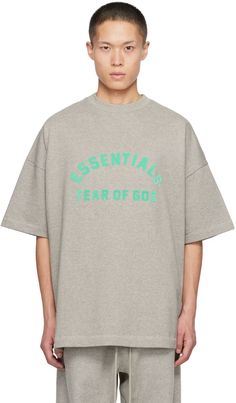 Fear of God ESSENTIALS: Gray Crewneck T-Shirt | SSENSE Streetwear Crew Neck T-shirt With Front Logo, Streetwear T-shirt With Front Logo And Crew Neck, Relaxed Fit Streetwear Tops With Front Logo, Relaxed Fit Tops With Front Logo For Streetwear, Green Casual Logo T-shirt, Green Casual T-shirt With Logo, Casual Green Logo T-shirt, Casual Streetwear T-shirt With Front Logo, Crew Neck Top With Front Logo For Streetwear